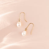 Baroque Freshwater Cultured Pearl Earrings with a Pear cut diamond in yellow gold
