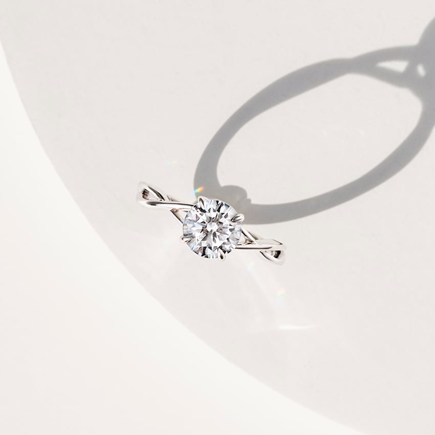 Alya Twist Solitaire Engagement Ring