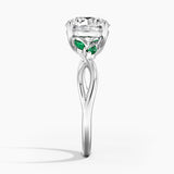 Willow Engagement Ring with Lab Emerald Accents with a Round cut diamond in white gold — profile view