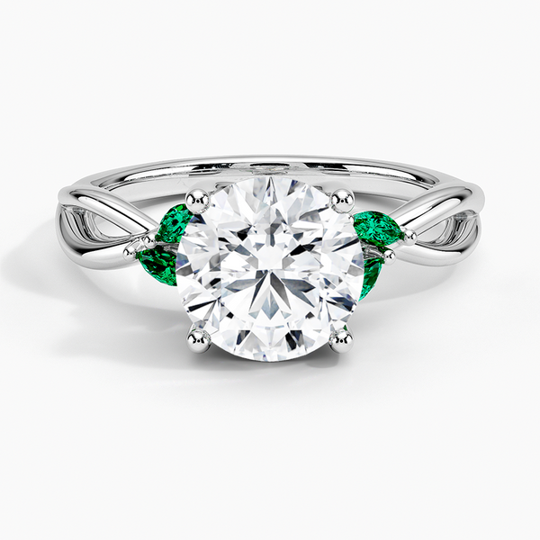 Willow Engagement Ring with Lab Emerald Accents with a Round cut diamond in white gold — top view