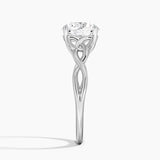 Celtic Love Knot Engagement Ring with a Round cut diamond in white gold — profile view
