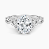 Celtic Love Knot Engagement Ring with a Oval cut diamond in white gold — top view