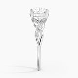 Budding Willow Solitaire Engagement Ring with a Round cut diamond in white gold — profile view