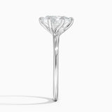 Delilah Twist Solitaire Engagement Ring with a Oval cut diamond in white gold — profile view