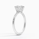 Delilah Twist Solitaire Engagement Ring with a Round cut diamond in white gold — side view