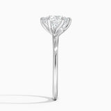 Delilah Twist Solitaire Engagement Ring with a Round cut diamond in white gold — profile view