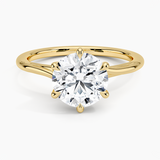 Delilah Twist Solitaire Engagement Ring with a Round cut diamond in yellow gold — top view