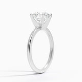 Four-Prong Comfort Fit 1.5mm Engagement Ring with a Round cut diamond in white gold — side view