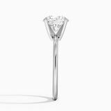 Four-Prong Comfort Fit 1.5mm Engagement Ring with a Round cut diamond in white gold — profile view