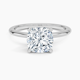 Four-Prong Comfort Fit 1.5mm Engagement Ring with a Cushion cut diamond in white gold — top view