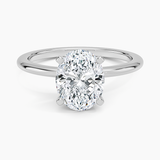 Four-Prong Comfort Fit 1.5mm Engagement Ring with a Oval cut diamond in white gold — top view