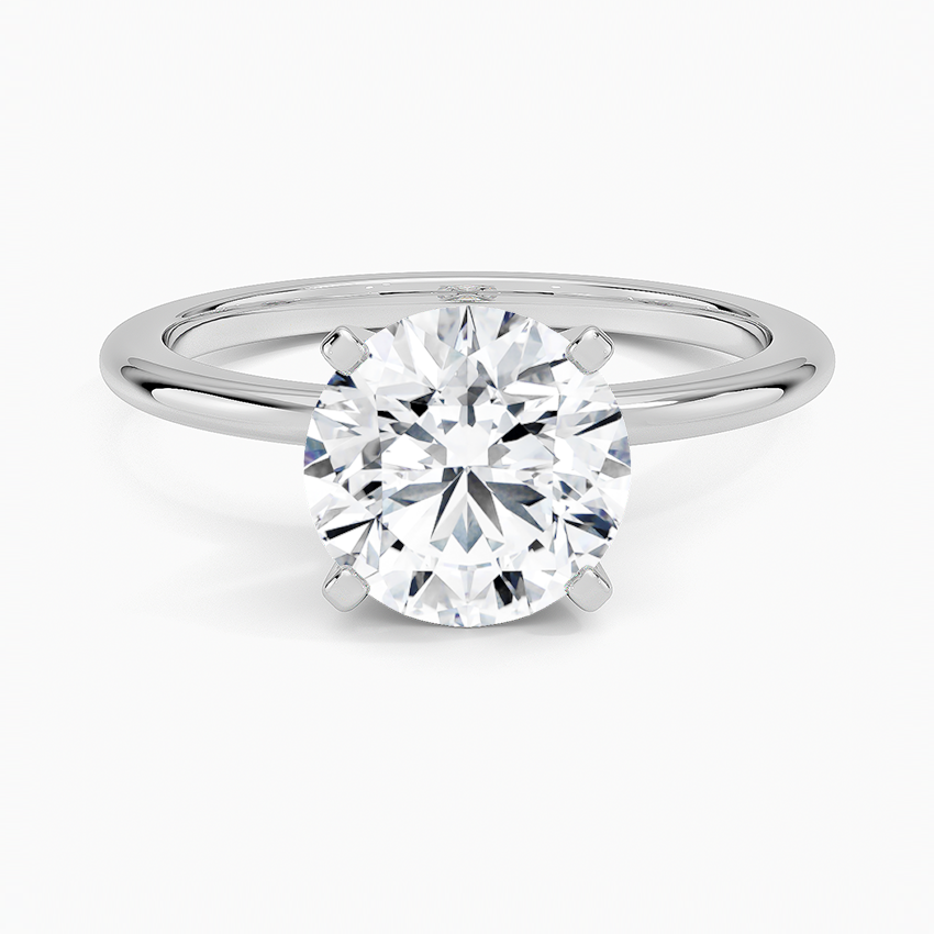 Four-Prong Comfort Fit 1.5mm Engagement Ring with a Round cut diamond in white gold — top view