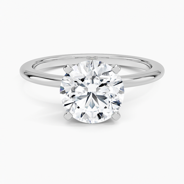 Four-Prong Comfort Fit 1.5mm Engagement Ring with a Round cut diamond in white gold — top view