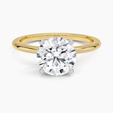 Four-Prong Comfort Fit 1.5mm Engagement Ring with a Round cut diamond in yellow gold — top view