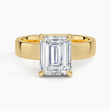 Peyton Solitaire Engagement Ring with a Emerald cut diamond in yellow gold — top view