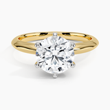 Classic Six-Prong Solitaire Engagement Ring with a Round cut diamond in yellow gold — top view