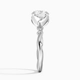 Rose Thorn Solitaire Engagement Ring with a Round cut diamond in white gold — profile view