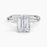 Rose Thorn Solitaire Engagement Ring with a Emerald cut diamond in white gold — top view