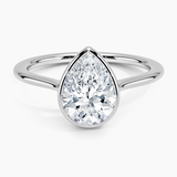 Petite Luna 1.5mm Bezel Engagement Ring with a Pear cut diamond in white gold — top view
