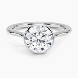 Petite Luna 1.5mm Bezel Engagement Ring with a Round cut diamond in white gold — top view