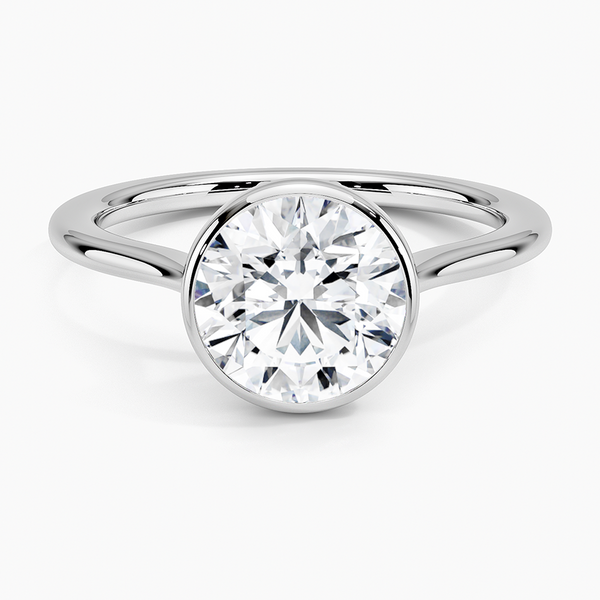 Petite Luna 1.5mm Bezel Engagement Ring with a Round cut diamond in white gold — top view