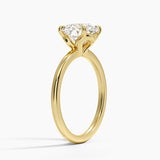 Hidden Heart Solitaire Engagement Ring with a Round cut diamond in yellow gold — side view