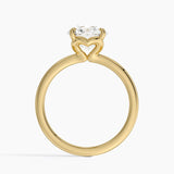 Hidden Heart Solitaire Engagement Ring with a Round cut diamond in yellow gold — profile view