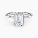 Hidden Heart Solitaire Engagement Ring with a Emerald cut diamond in white gold — top view
