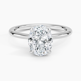 Hidden Heart Solitaire Engagement Ring with a Oval cut diamond in white gold — top view
