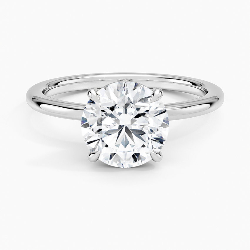 Hidden Heart Solitaire Engagement Ring with a Round cut diamond in white gold — top view