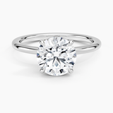 Hidden Heart Solitaire Engagement Ring with a Round cut diamond in white gold — top view