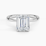 Freesia 2mm Solitaire Engagement Ring with a Emerald cut diamond in white gold — top view