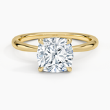 Freesia 2mm Solitaire Engagement Ring with a Cushion cut diamond in yellow gold — top view
