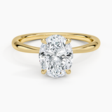 Freesia 2mm Solitaire Engagement Ring with a Oval cut diamond in yellow gold — top view