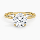 Freesia 2mm Solitaire Engagement Ring with a Round cut diamond in yellow gold — top view
