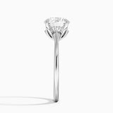 Petal Solitaire Engagement Ring with a Round cut diamond in white gold — profile view