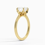 Petal Solitaire Engagement Ring with a Round cut diamond in yellow gold — side view