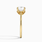 Petal Solitaire Engagement Ring with a Round cut diamond in yellow gold — profile view