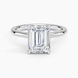 Fleur Solitaire Engagement Ring with a Emerald cut diamond in white gold — top view