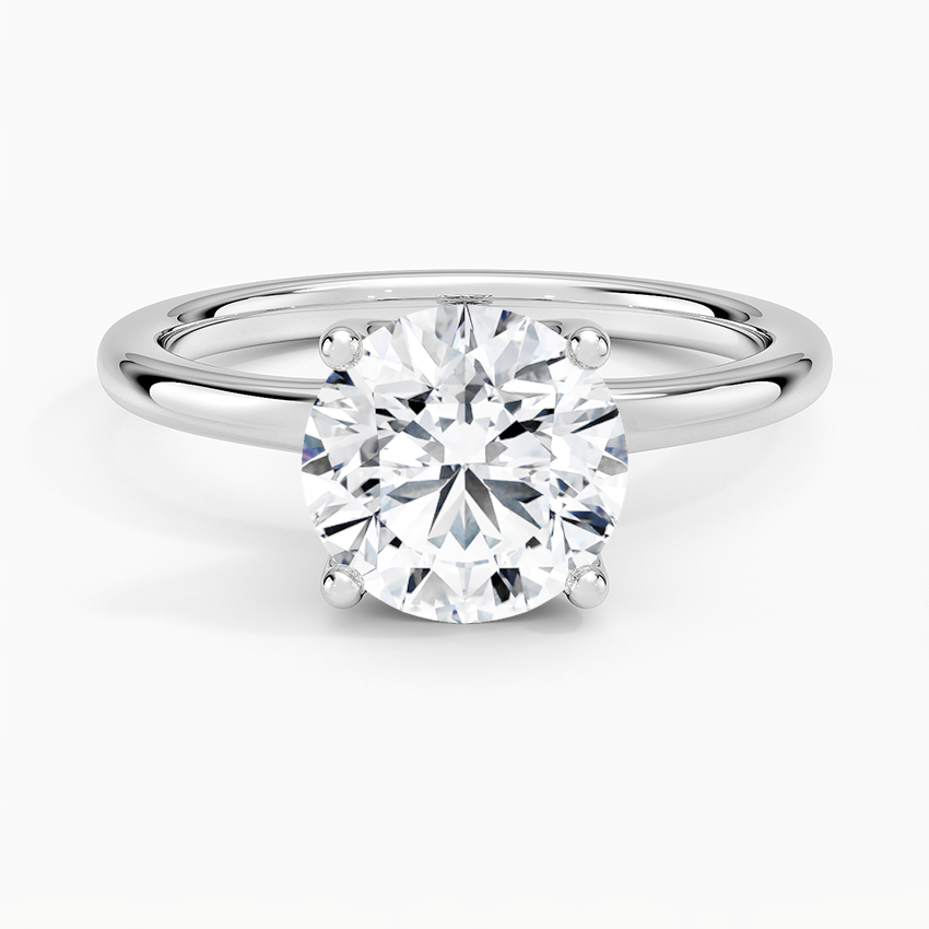 Fleur Solitaire Engagement Ring with a Round cut diamond in white gold — top view