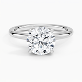 Fleur Solitaire Engagement Ring with a Round cut diamond in white gold — top view