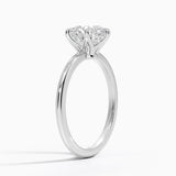 Aveline Solitaire Engagement Ring with a Round cut diamond in white gold — side view