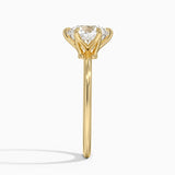 Aveline Solitaire Engagement Ring with a Round cut diamond in yellow gold — profile view