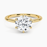 Aveline Solitaire Engagement Ring with a Round cut diamond in yellow gold — top view