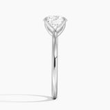 Elodie Cathedral Solitaire Engagement Ring with a Round cut diamond in white gold — profile view