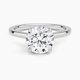 Elodie Cathedral Solitaire Engagement Ring with a Round cut diamond in white gold — top view