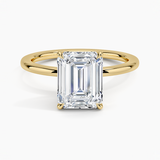 Audrey Perfect Fit Solitaire Engagement Ring with a Emerald cut diamond in yellow gold — top view