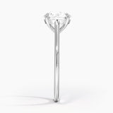 Provence Solitaire Engagement Ring with a Round cut diamond in white gold — profile view