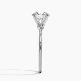 Entwined Solitaire Engagement Ring with a Round cut diamond in white gold — profile view