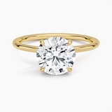 Entwined Solitaire Engagement Ring with a Round cut diamond in yellow gold — top view